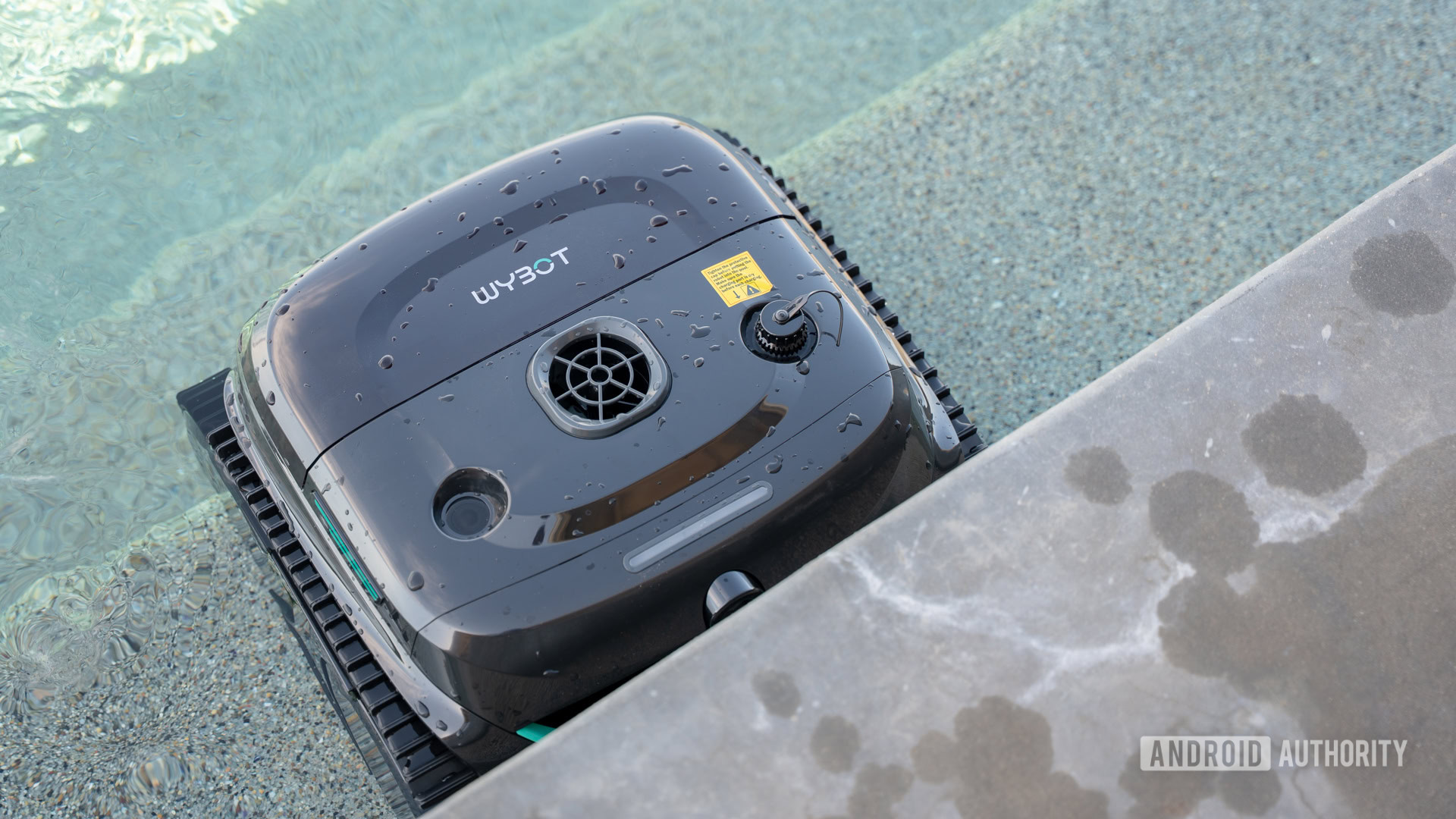 Wybot C2 Vision next to pool wet 2