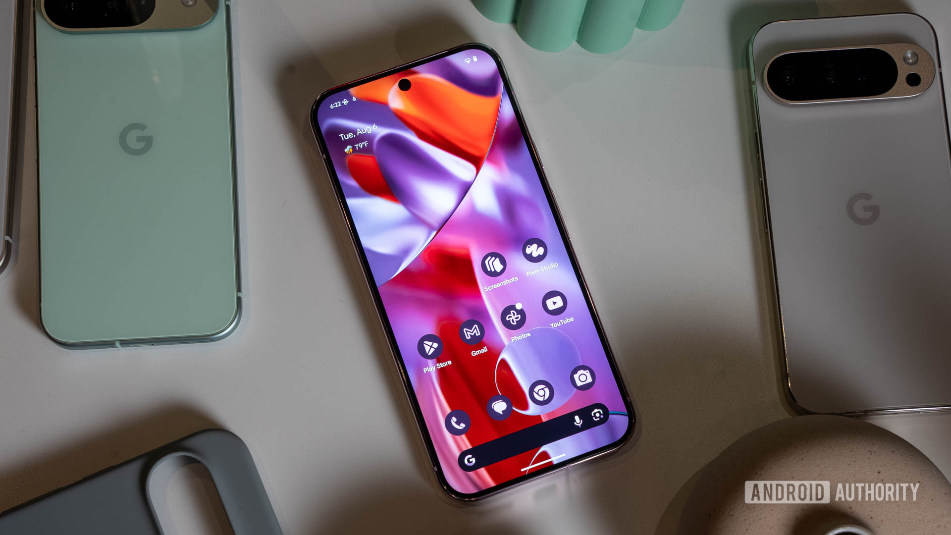 Google Pixel 9 Pro home screen display next to other Pixel phones Google Pixel 9 Pro home screen display next to other Pixel phones