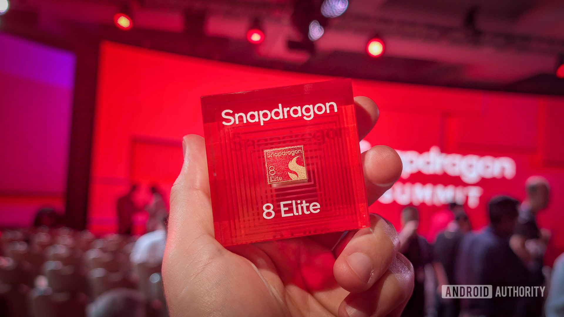 Snapdragon 8 Elite chip in hand Snapdragon 8 Elite chip in hand