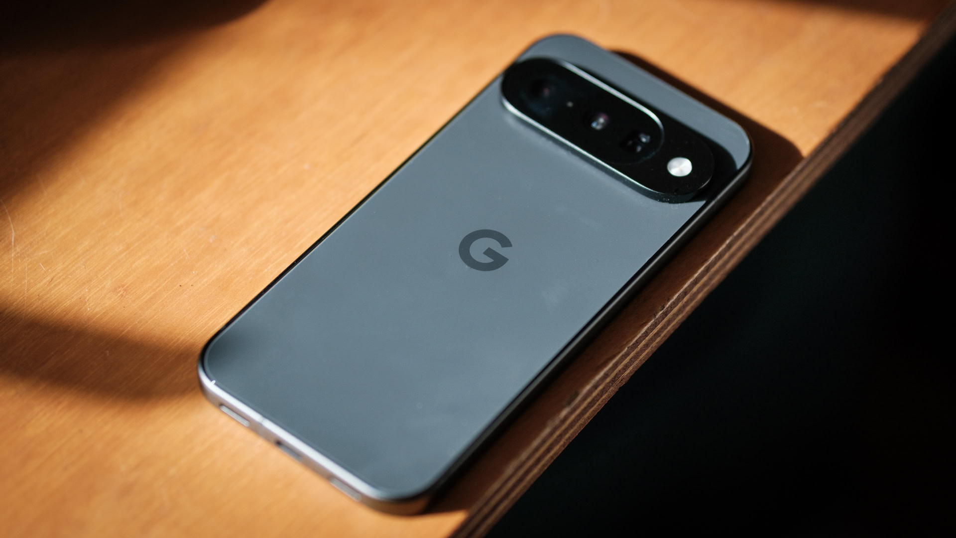 Google Pixel 10 lying on desk