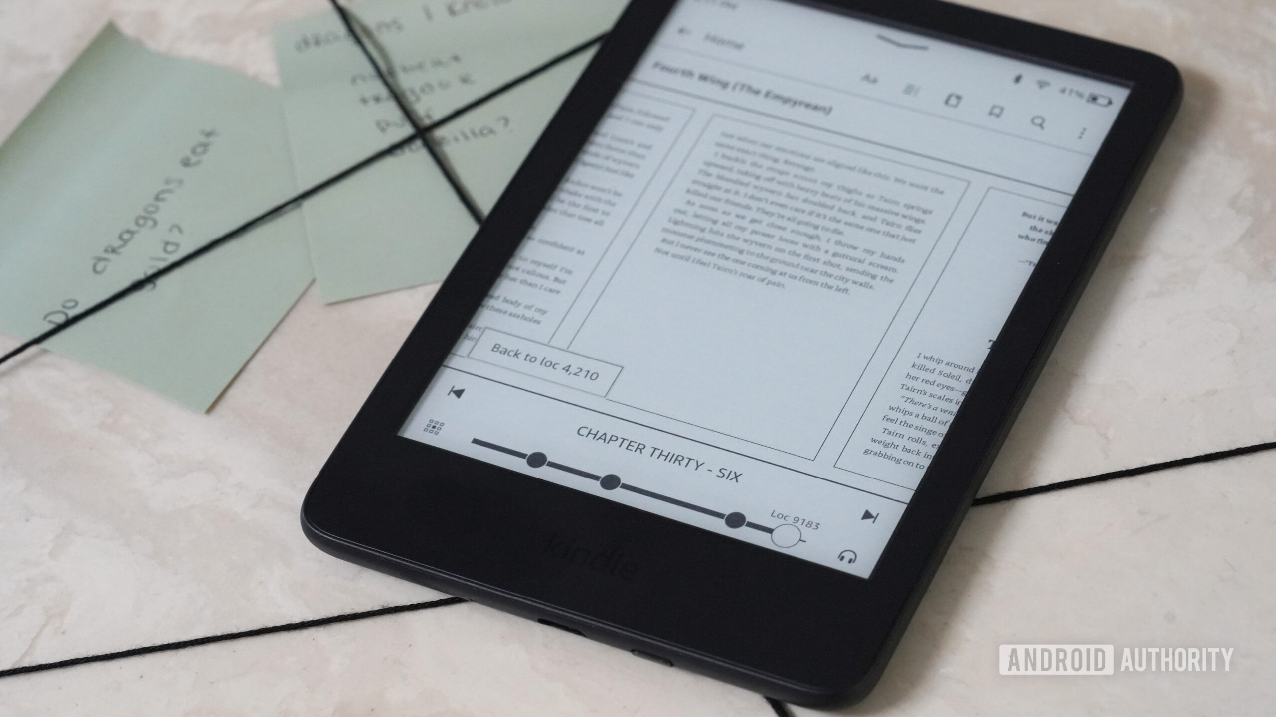 A Kindle user accesses Page Flip by swiping up.