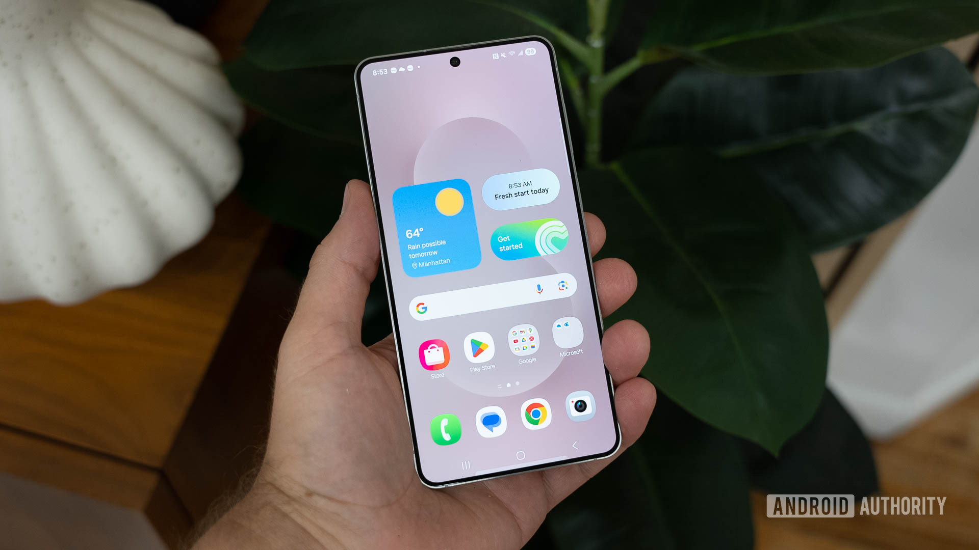 Samsung Galaxy S25 Edge Home Screen In Hand Showing One UI 7
