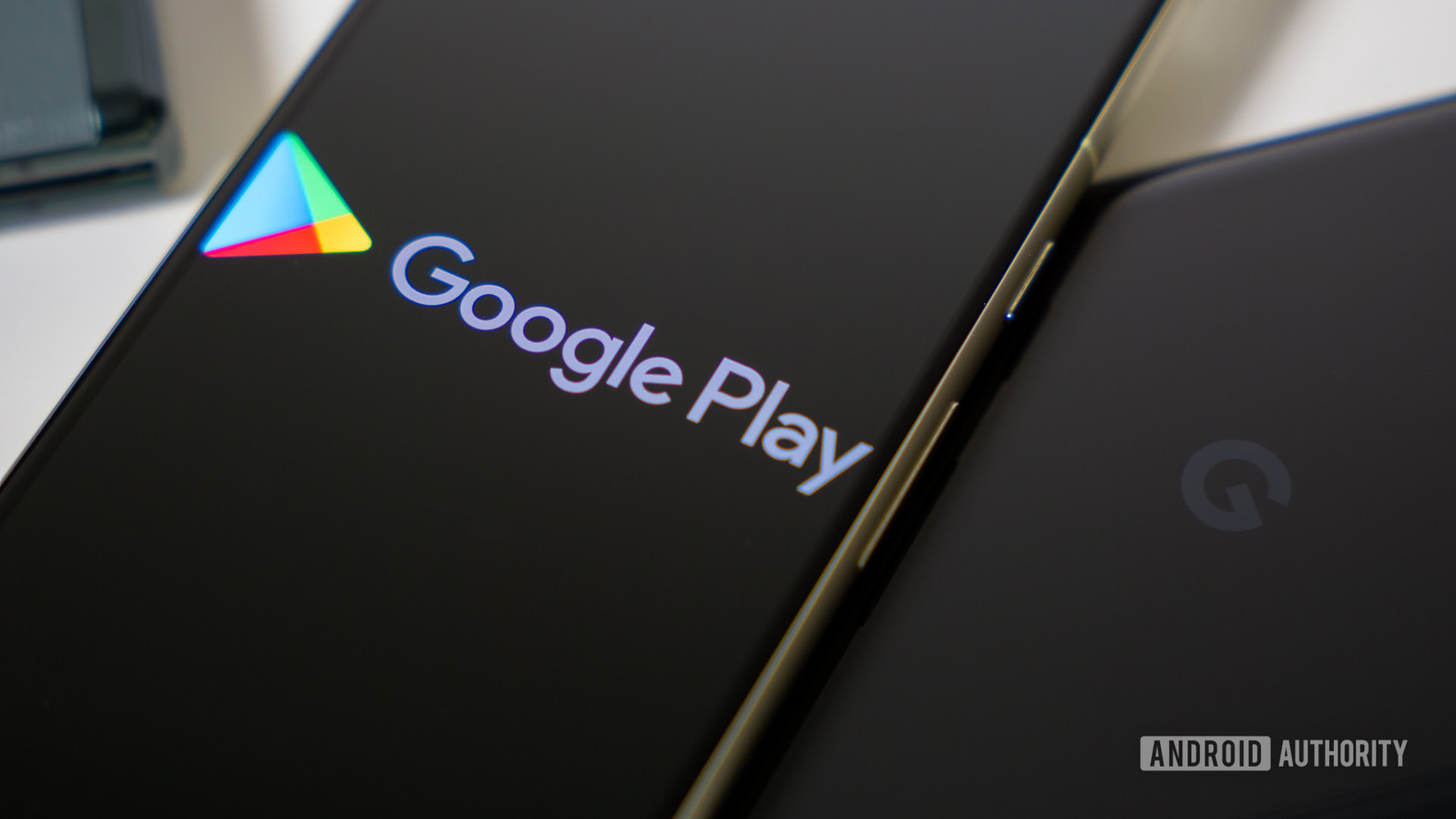 Google Play Store logo on smartphone stock photo (3) Google Play Store logo on smartphone stock photo (3)