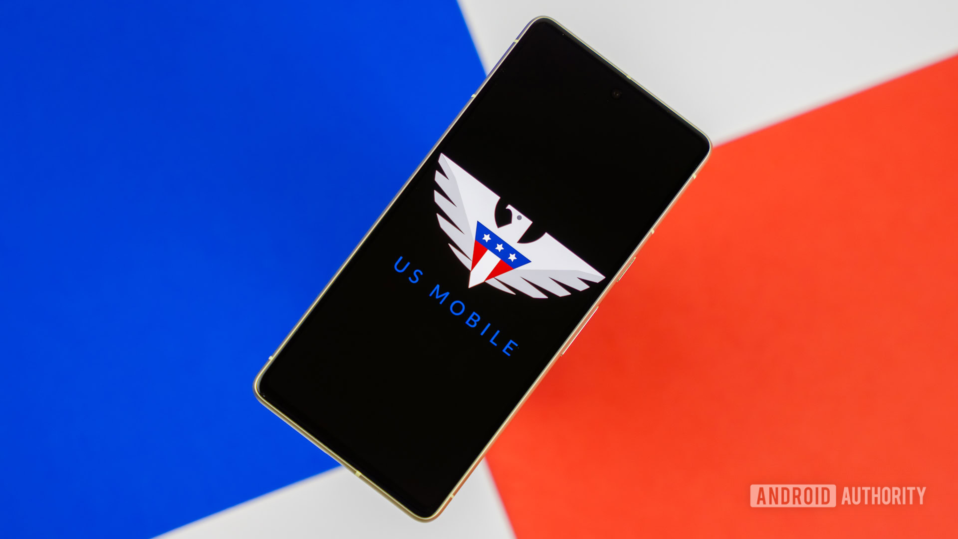 US Mobile logo on smartphone stock photo (2) US Mobile logo on smartphone stock photo (2)