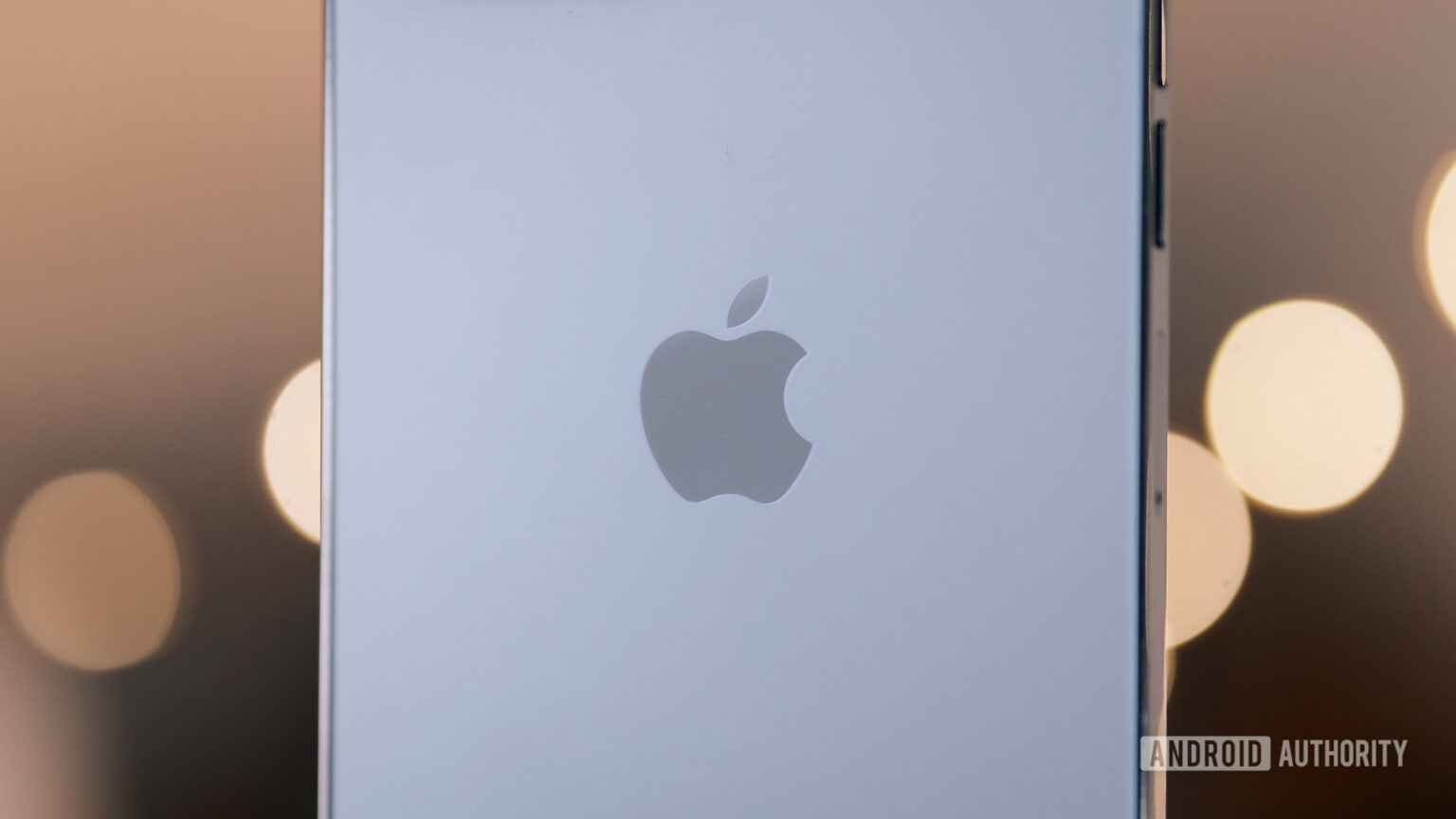 Apple logo on the back of an iPhone