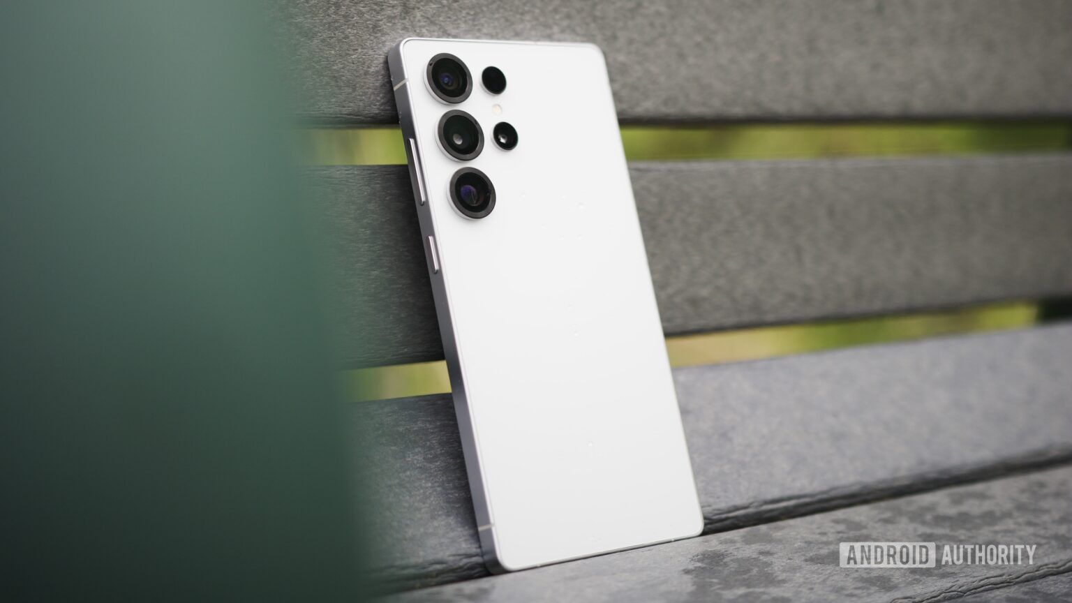 The Samsung Galaxy S25 Ultra propped upright on a bench.