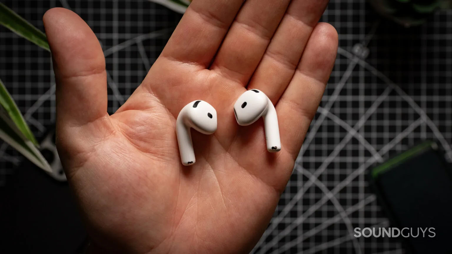 Apple AirPods 4 with ANC in hand