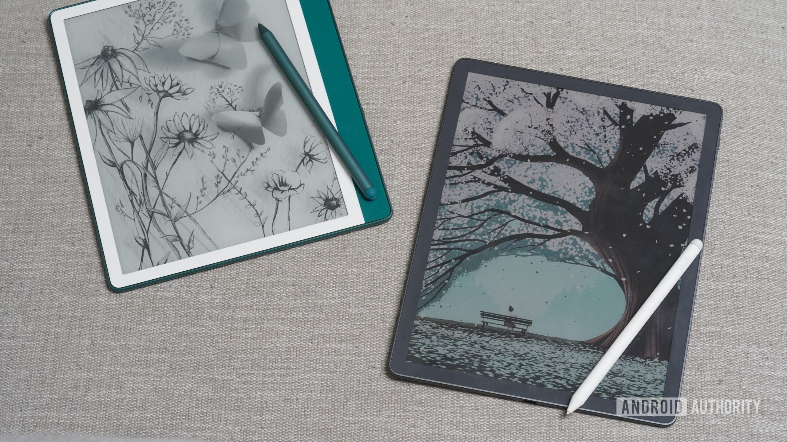 A Kindle Scribe Colorsoft rests next to the previous generation.