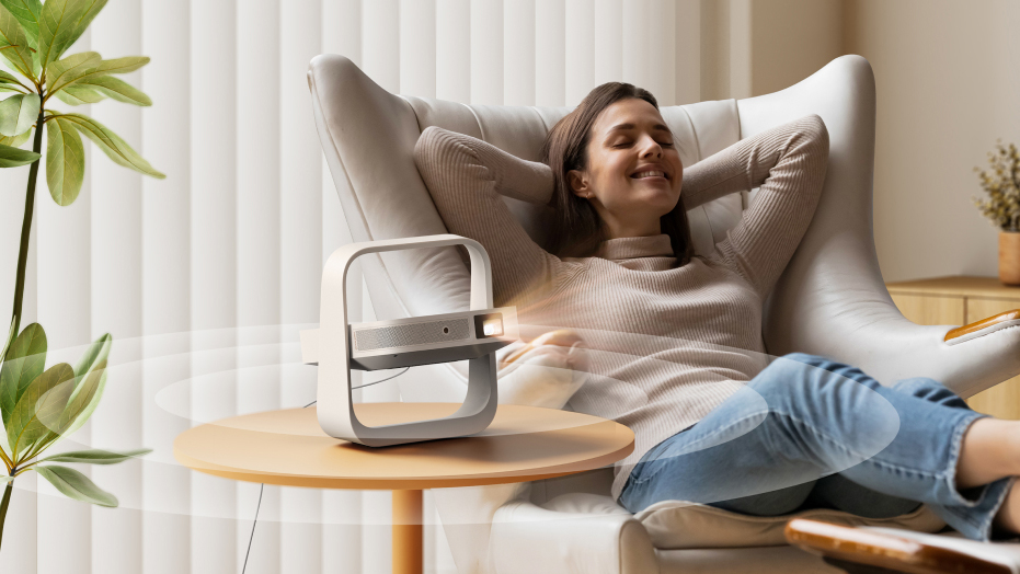 Woman enjoying XGIMI Elfin Flip Plus