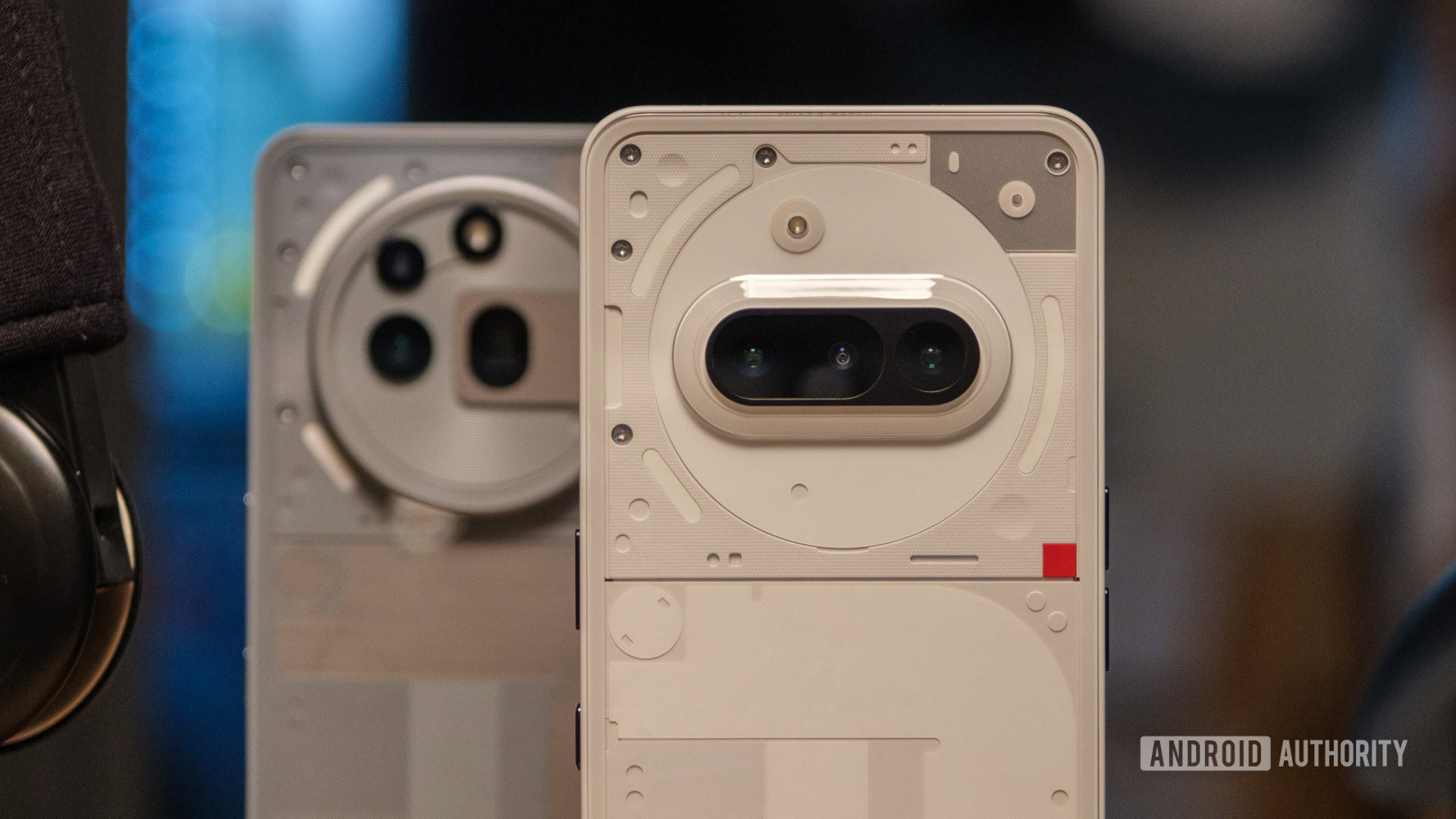 Nothing Phone 3a cameras close up in front of 3a Pro