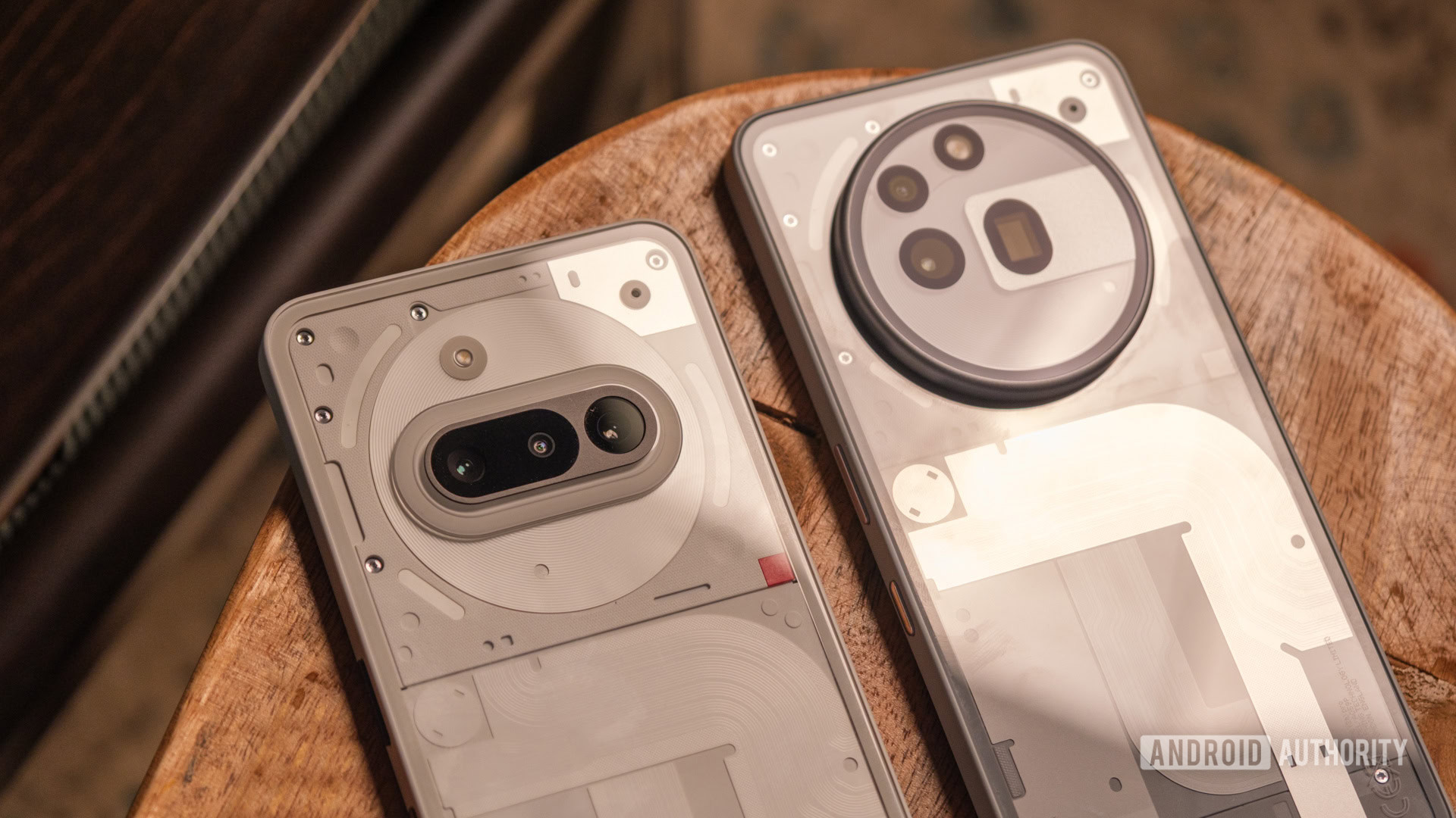 Nothing Phone 3a lying next to Phone 3a Pro