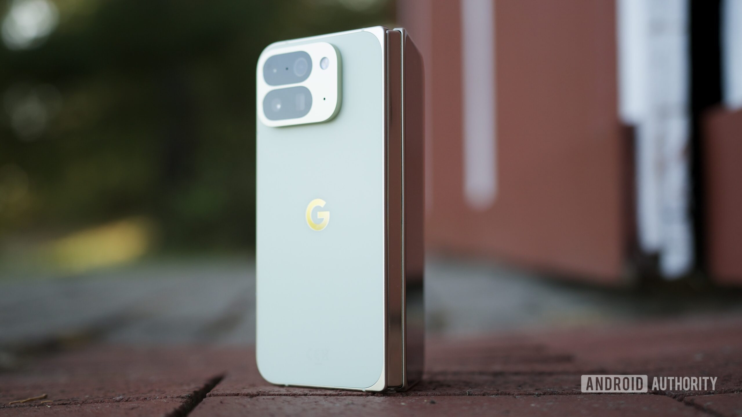The Google Pixel 10 Pro Fold standing upright outside.